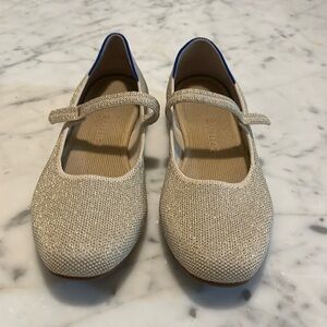 Gold Mary Jane style Rothy’s, size 6.